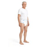 Older man wearing a white adult incontinence brief with side tabs, full body view