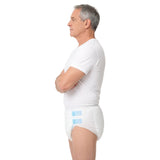 Side profile of a man wearing an adult incontinence brief with two side tabs