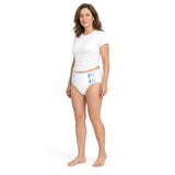 Woman wearing a tab-style adult brief, three-quarter view showing waist and leg fit